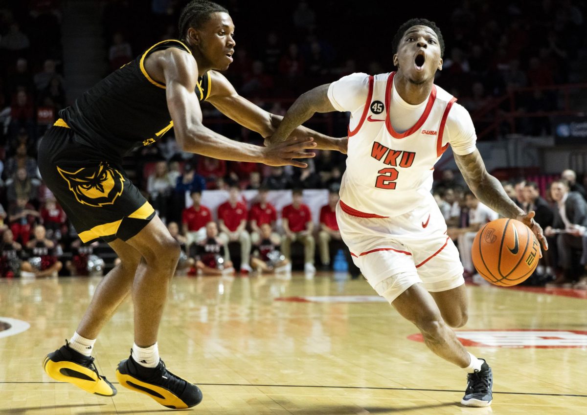 WKU guard Don McHenry (2) drives the ball down the court during the Hilltopper's game against the Kennesaw State Owls in Bowling Green, Ky. on Saturday, Jan. 11, 2025.