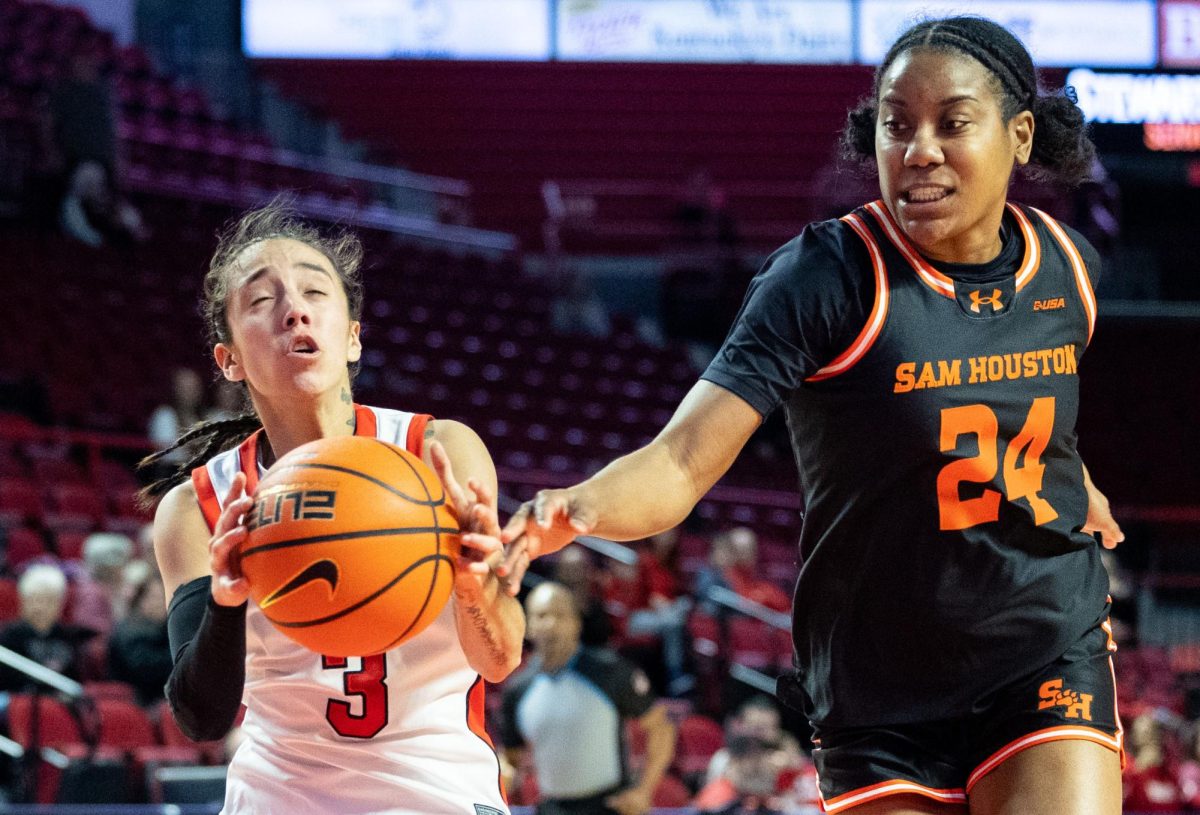 Western Kentucky Lady Toppers guard Alexis Mead (3) drives the lane during a game against Sam Houston State University in Diddle Arena on Saturday, Jan. 25, 2025. 