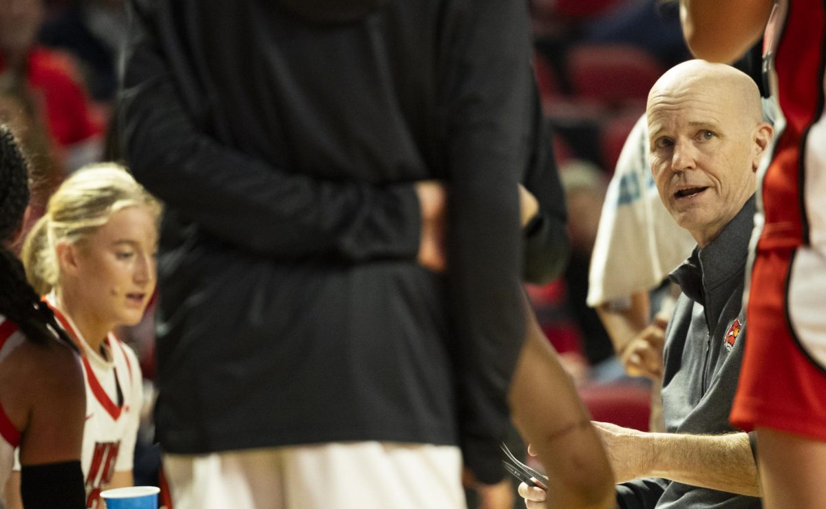 WKU head coach Greg Collins speaks with his team during the Lady Topper's game against the Sam Houston Bearkats in Bowling Green, Ky. on Saturday, Jan. 25, 2025.