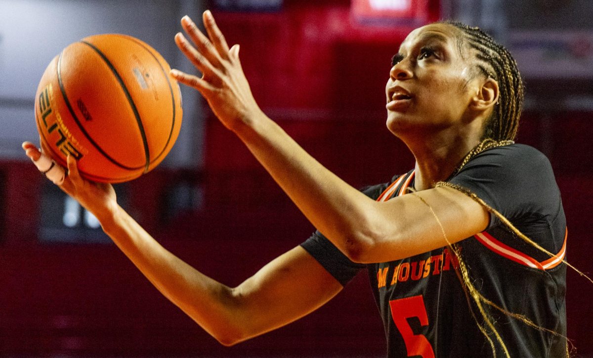 Sam Houston guard guard Aysia Ward-Strong (5) makes a layup during the Lady Topper's game against the Sam Houston Bearkats in Bowling Green, Ky. on Saturday, Jan. 25, 2025.