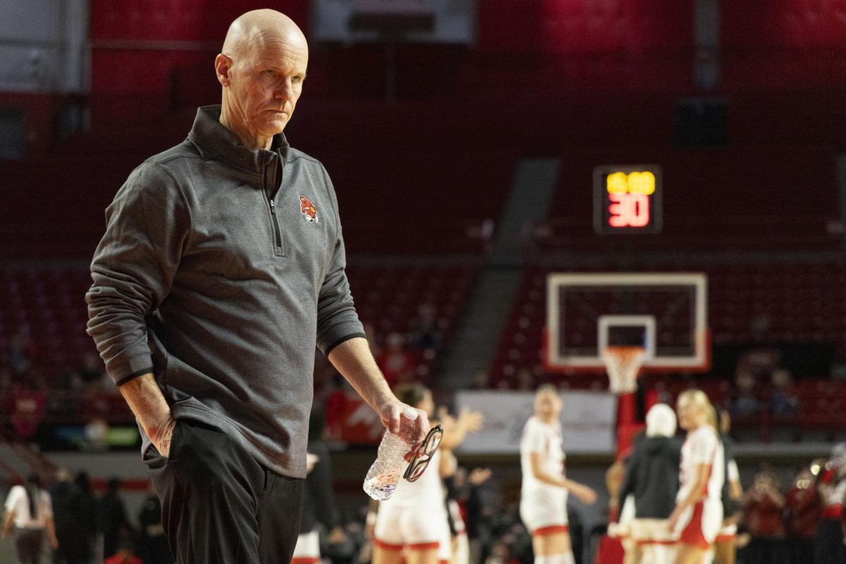 WKU head coach Greg Collins walks off the court at halftime during the Lady Topper's game against the Sam Houston Bearkats in Bowling Green, Ky. on Saturday, Jan. 25, 2025.