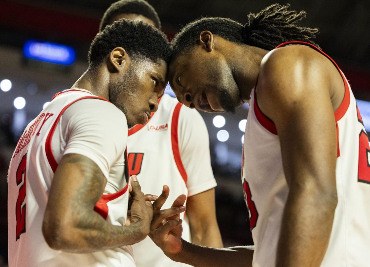 Western Kentucky Hilltoppers guard Don McHenry (2) and guard Enoch Kalambay (23) celebrate a play by McHenry during the Hilltoppers game against the UTEP Miners in Bowling Green, Ky. on Thursday, Jan. 30, 2025. 