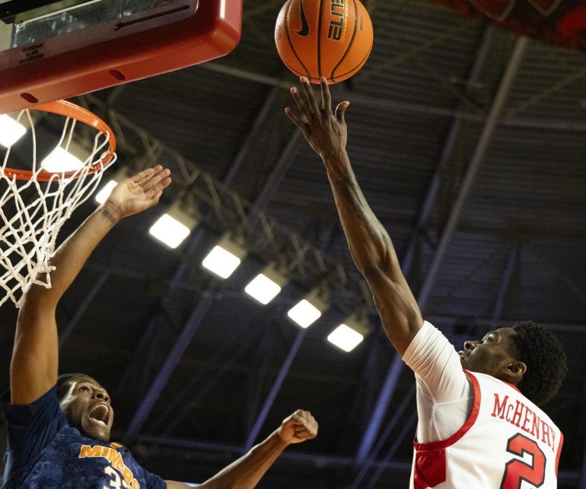 Western Kentucky Hilltoppers guard Don McHenry (2) guides the ball into the basket during the Hilltoppers game against the UTEP Miners in Bowling Green, Ky. on Thursday, Jan. 30, 2025. 