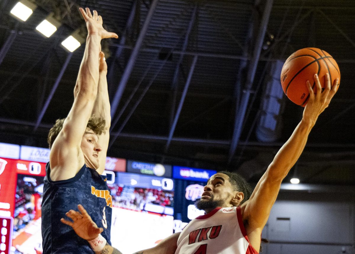 Western Kentucky Hilltoppers guard Khristian Lander (4) shoots the ball during the Hilltoppers game against the UTEP Miners in Bowling Green, Ky. on Thursday, Jan. 30, 2025. 