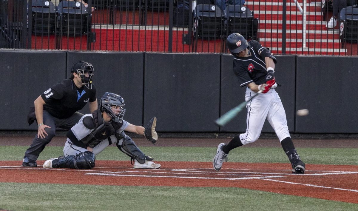 Western Kentucky University right-handed pitcher Ryan Wideman (33) swings for the ball during WKU vs Eastern Kentucky University at Nick Denes Field with the final score being 11-3 on February 25, 2025.