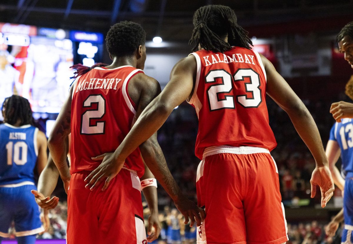 Western Kentucky Hilltoppers guard Don McHenry (2) and guard Enoch Kalambay (23) celebrate a play during the Hilltoppers game against the Middle Tennessee State University Blue Raiders in Bowling Green, Ky. on Saturday, Feb. 15, 2025. 