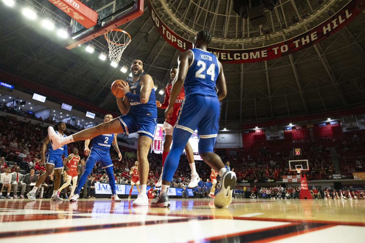 Blue Raider forward Essam Mostafa (44) rebounds the ball after a missed free throw during the Hilltoppers game against the Middle Tennessee State University Blue Raiders in Bowling Green, Ky. on Saturday, Feb. 15, 2025. 