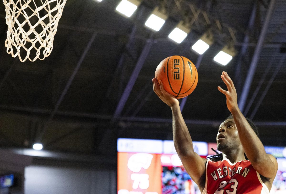 Western Kentucky Hilltoppers guard Enoch Kalambay (23)makes a layup during the Hilltoppers game against the Middle Tennessee State University Blue Raiders in Bowling Green, Ky. on Saturday, Feb. 15, 2025. 