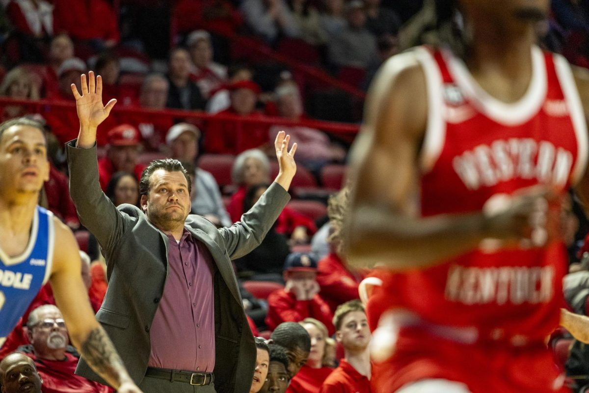 WKU head coach Hank Plona watches a shot in the air during the Hilltoppers game against the Middle Tennessee State University Blue Raiders in Bowling Green, Ky. on Saturday, Feb. 15, 2025. 