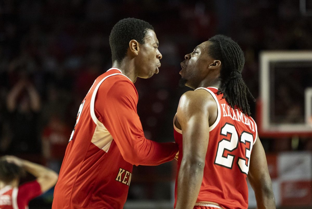 Western Kentucky Hilltoppers forward Leeroy Odiahi (21) and guard Enoch Kalambay (23) celebrate a play by Odiahi during the Hilltoppers game against the Middle Tennessee State University Blue Raiders in Bowling Green, Ky. on Saturday, Feb. 15, 2025. 