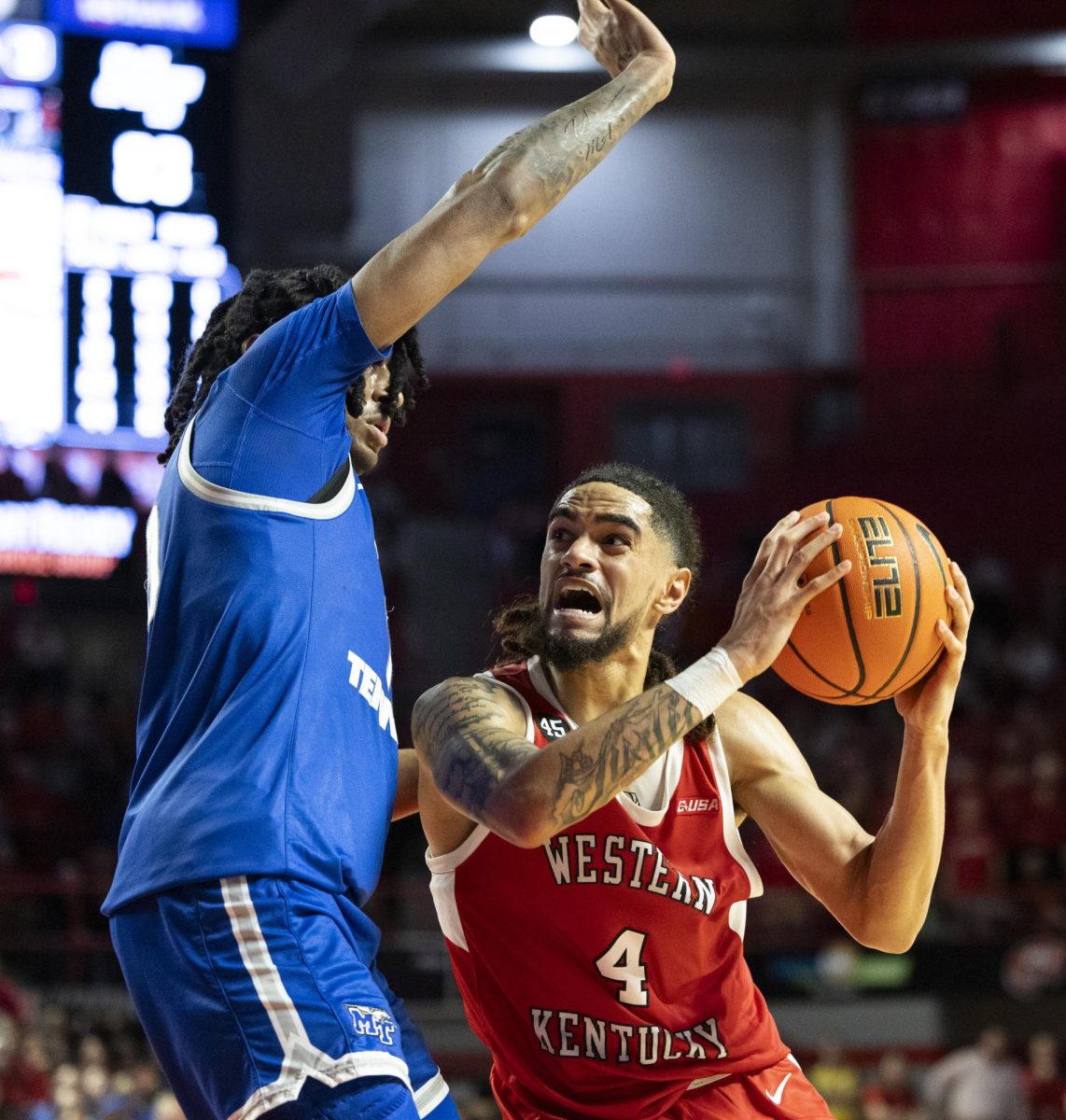 Western Kentucky Hilltoppers guard Khristian Lander (4)drives the ball during the Hilltoppers game against the Middle Tennessee State University Blue Raiders in Bowling Green, Ky. on Saturday, Feb. 15, 2025. 
