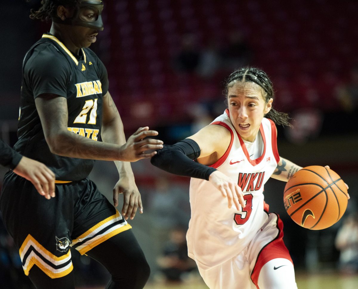 Western guard Alexis Mead (3) rushes the ball past the Kennesaw State defense in Diddle Arena on Thursday, February. 6, 2025. Alexis had the third highest score of the team at 15 points and the most rebounds and assists, both at 7.