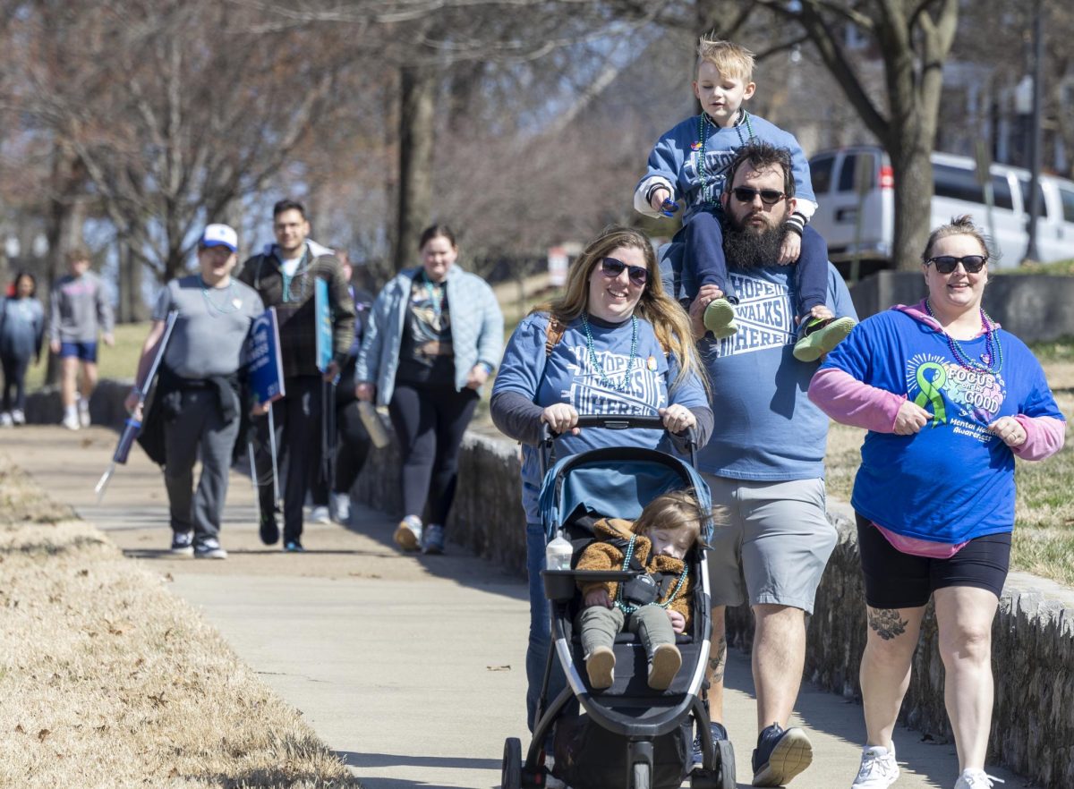 From left, Brittany Jackson, Elliot Jackson, Brandon Tracy, Verena Tracy, and Loxlee Tracy take part in the American Foundation for Suicide Prevention’s annual Walk for Suicide Prevention at Western Kentucky University on March 8, 2025. 'Here supporting the wonderful patients I treat in our community,' Brittany Jackson said.