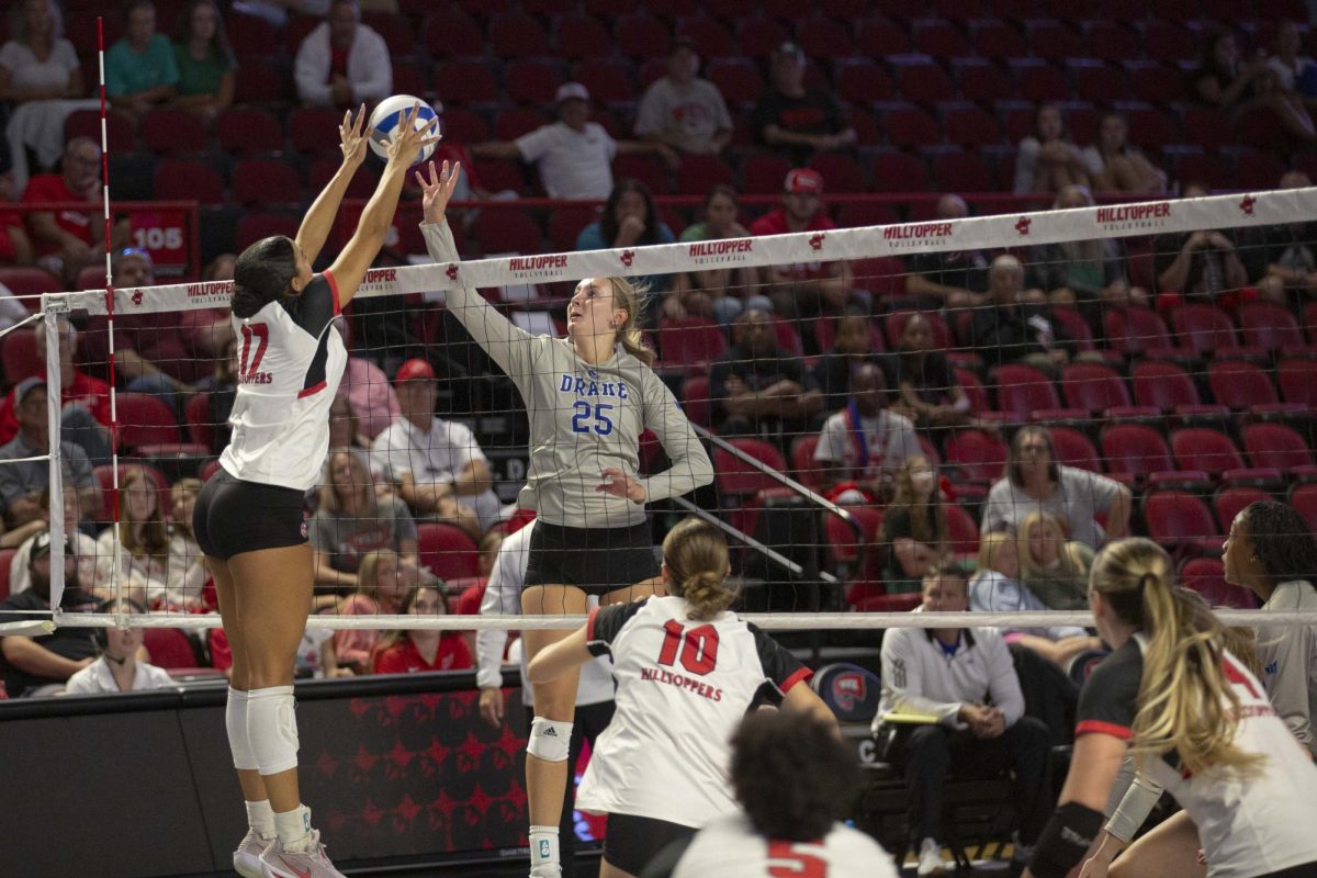Outside Hitter Alivia Skidmore (17) blocked the Bulldogs throughout set four during WKU’s game against Drake in Diddle Arena on Saturday, Aug. 30, 2025. 