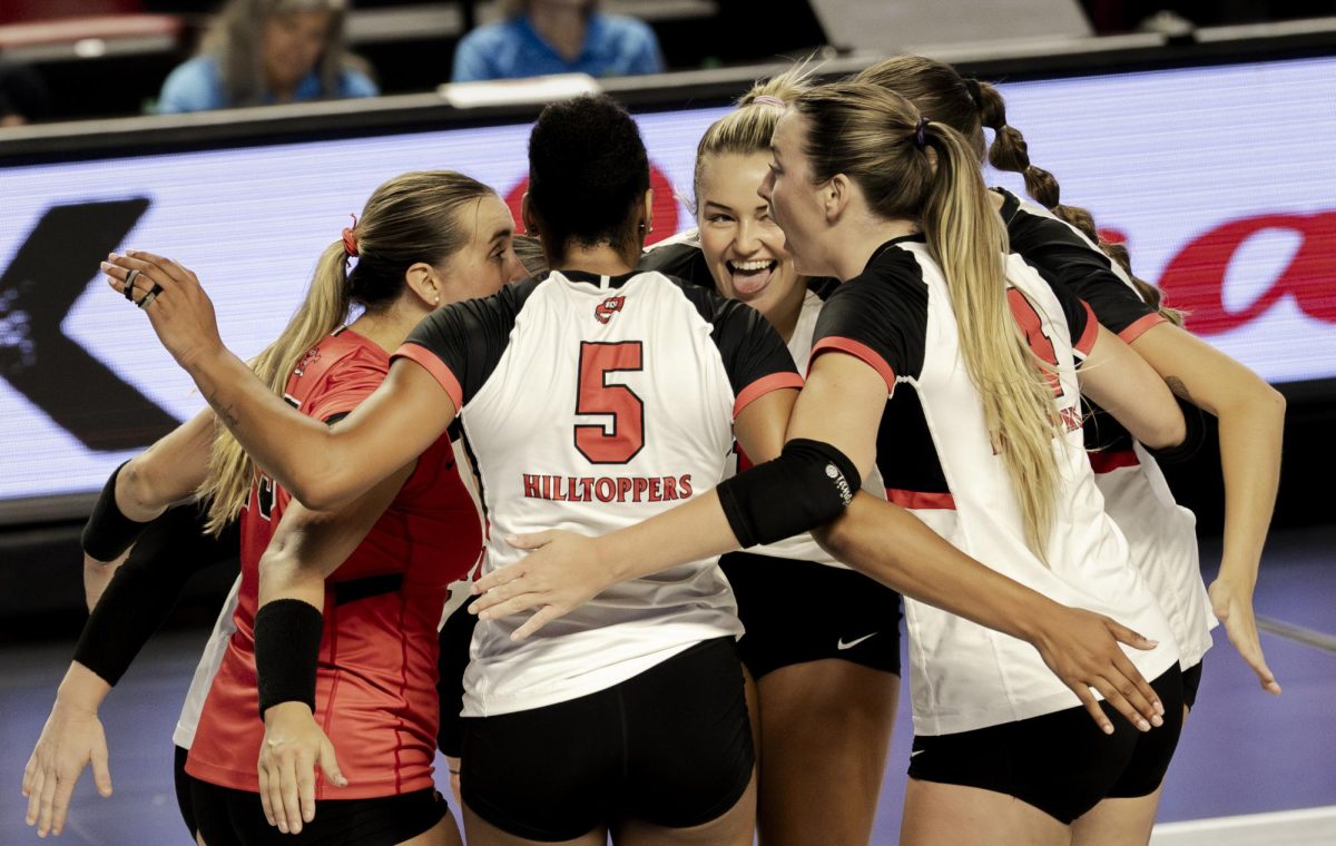 WKU volleyball players celebrate after scoring a point during their game against Wright State on Friday, Aug. 29, 2025.
