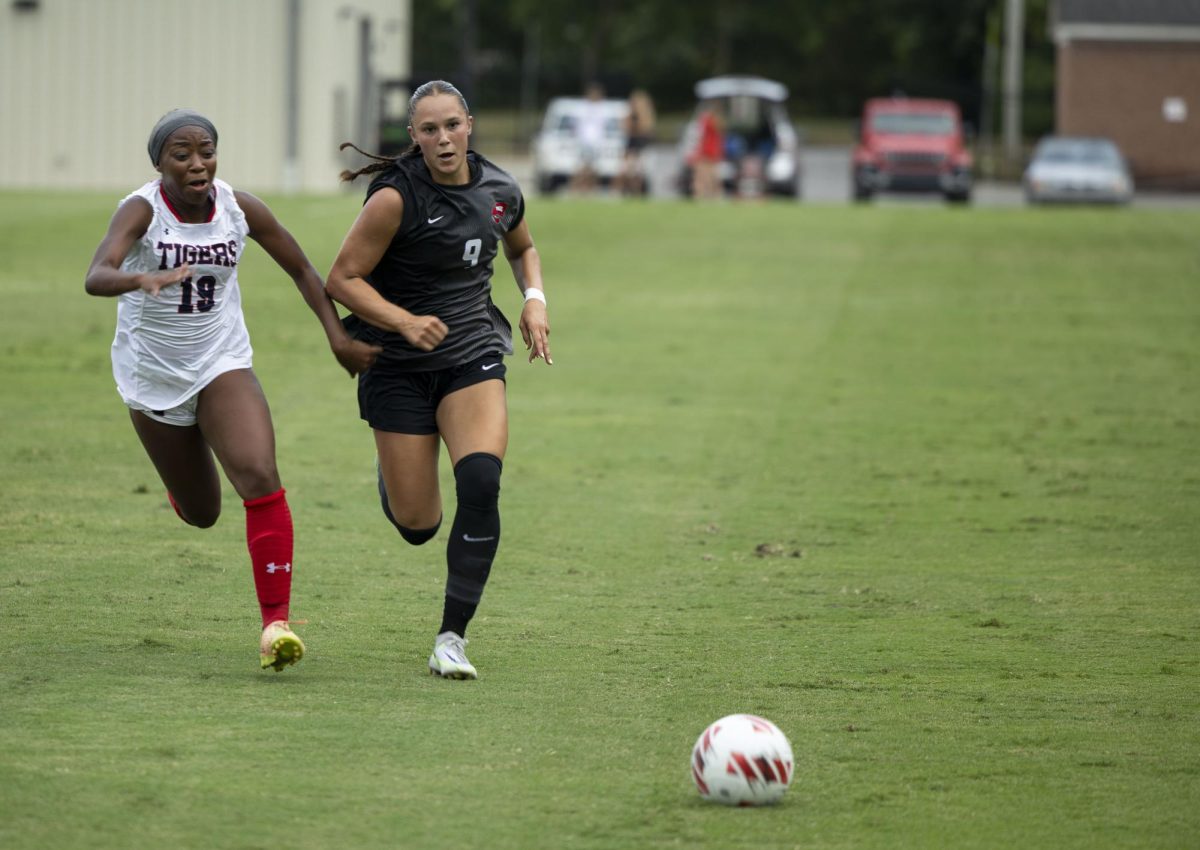 WKU Sophomore Midfielder/Defender Maggie Bellair and Jackson State Senior Midfielder Alayla Jackson race to the ball during their game in Bowling Green on Thursday, August 21, 2025. 