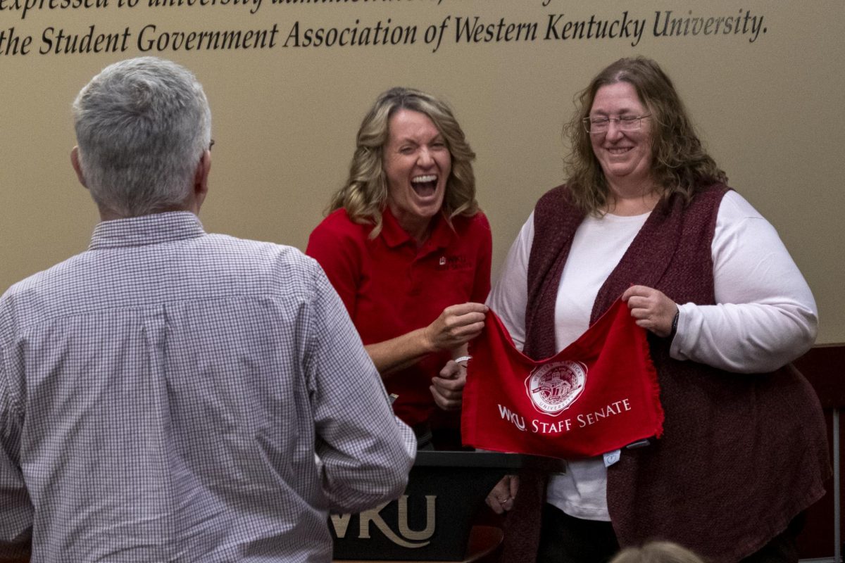Travel Coordinator Madona May poses for a photo with Chairwoman Leslie Vanderpool after being awarded the Christopher Ware Staff Star Awards during the monthly Staff Senate meeting in the SGA chambers on Sept. 2, 2025.