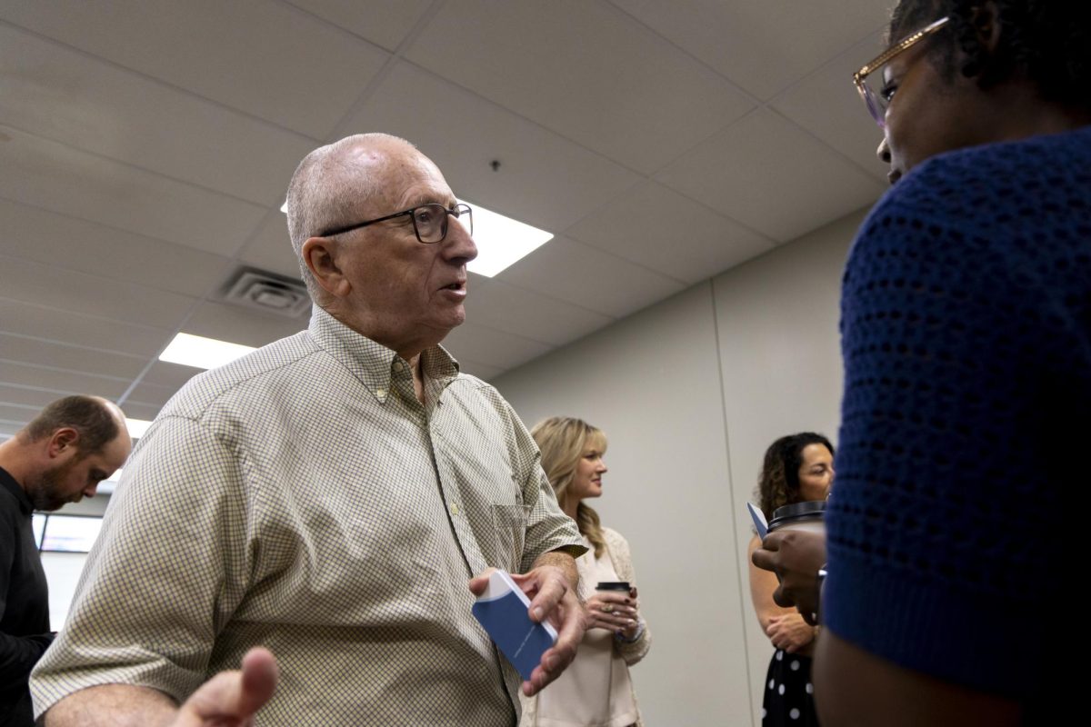 Miller Slaughter, an Small Business Accelerator (SBA) coach speaks with Sheena Wilder, a local business owner, prior to the start of the “Strong Community, Strong Coffee” meeting at the WKU Innovation Campus on Sept. 11, 2025.