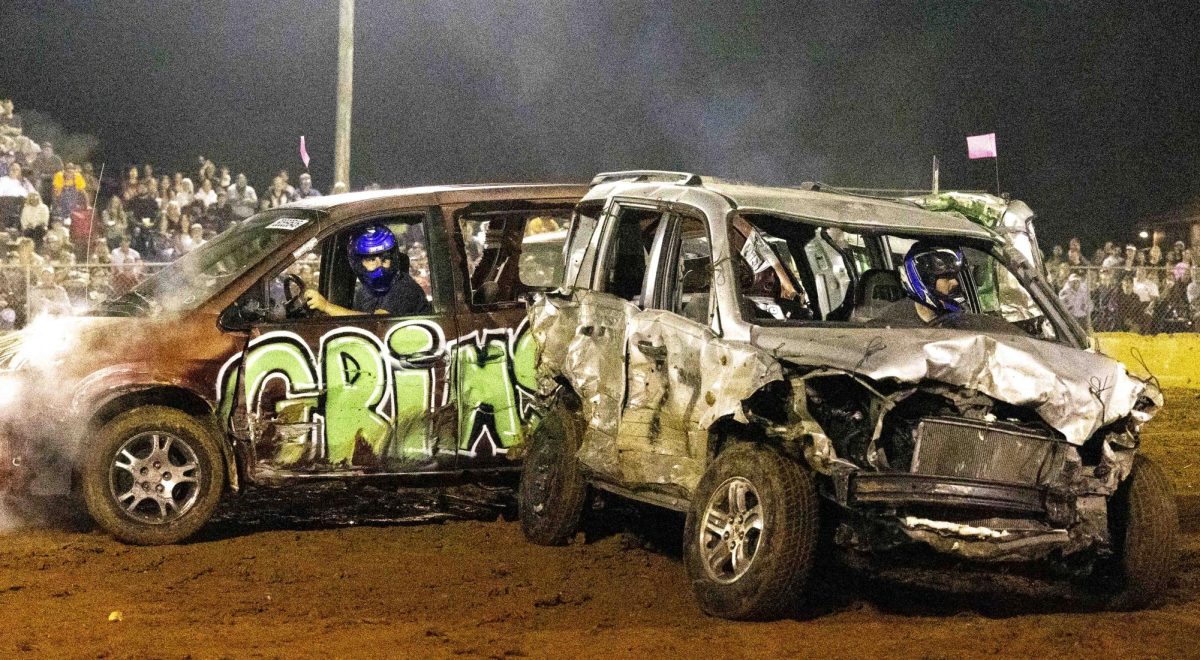 Car No. 16x and car No. 77 collide on Saturday, Sept. 27, 2025 during the second circuit of the King of The Bluegrass Demolition Derby at Allen County Fairgrounds in Scottsville, KY.