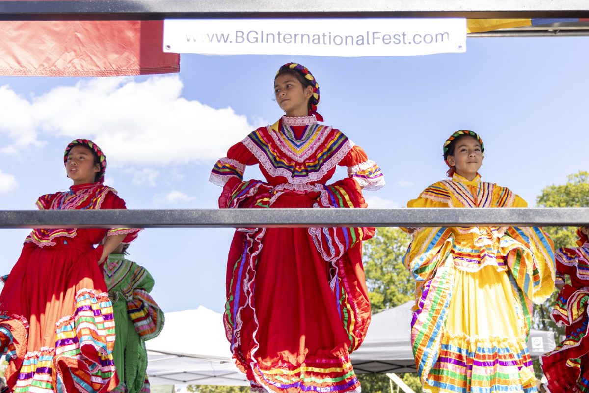 Eliana Pineda takes the stage with their fellow dancers during the Bowling Green International Festival at Circus Square Park on Saturday, Sept. 27, 2025.