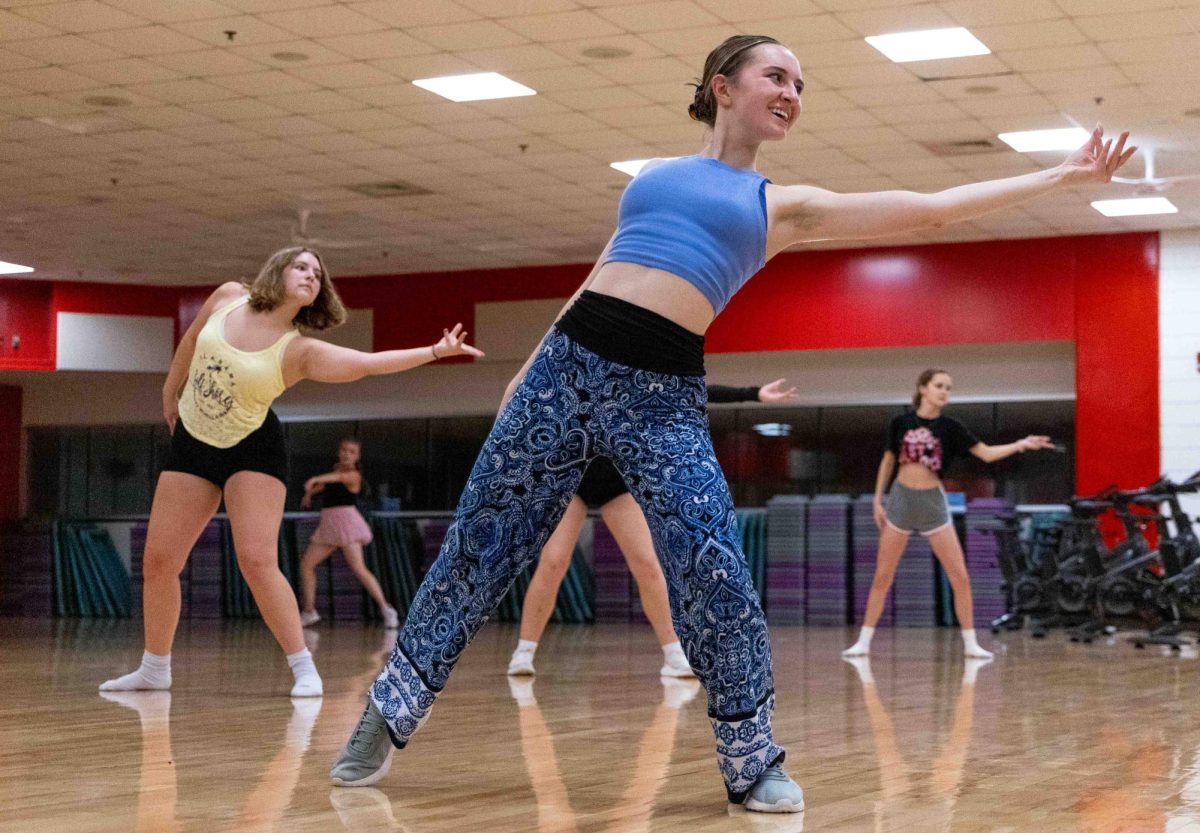 Freshman Interior Design major Morgan Solomon stays after the end of the weekly dance fundamentals class she teaches to help a few dancers master the routine they had been practicing at the WKU Preston Center on Sept. 24, 2025. The theme for the week’s class was “Hamilton.”