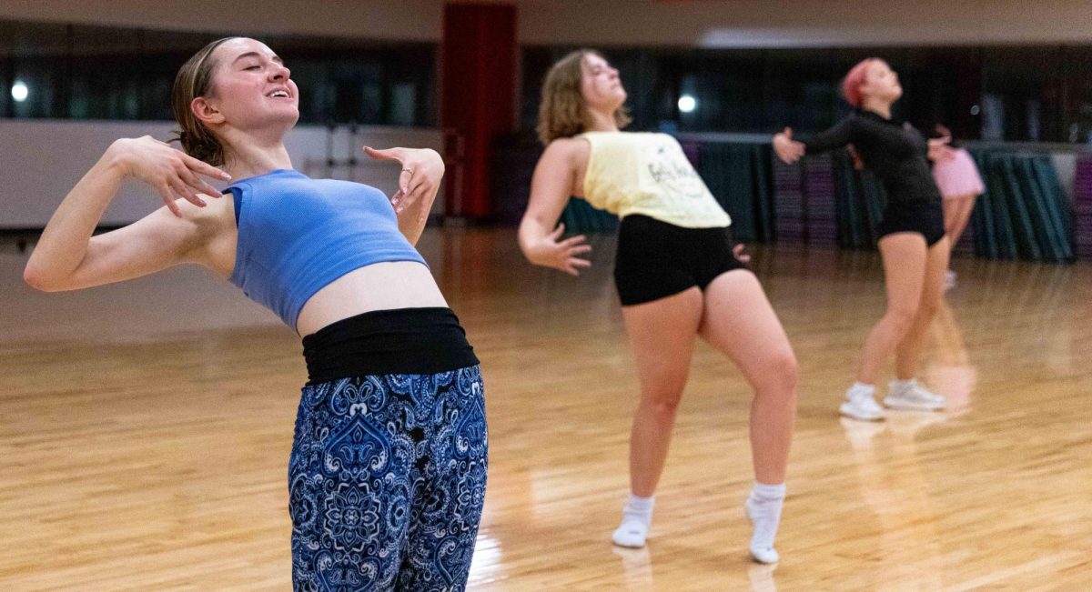 Freshman Interior Design major Morgan Solomon stays after the end of the weekly dance fundamentals class she teaches to help a few dancers master the routine they had been practicing at the WKU Preston Center on Sept. 24, 2025. The theme for the week’s class was “Hamilton.”