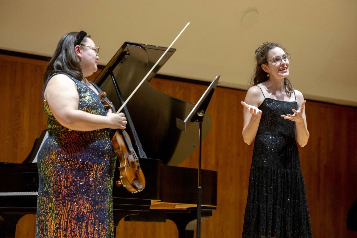 Jessie Welsh, WKU assistant piano professor, introduces special guest Sara Sasaki, renowned violin and viola player, during the Chamber Music by American Composers in FAC on Wednesday, Oct. 8, 2025. 