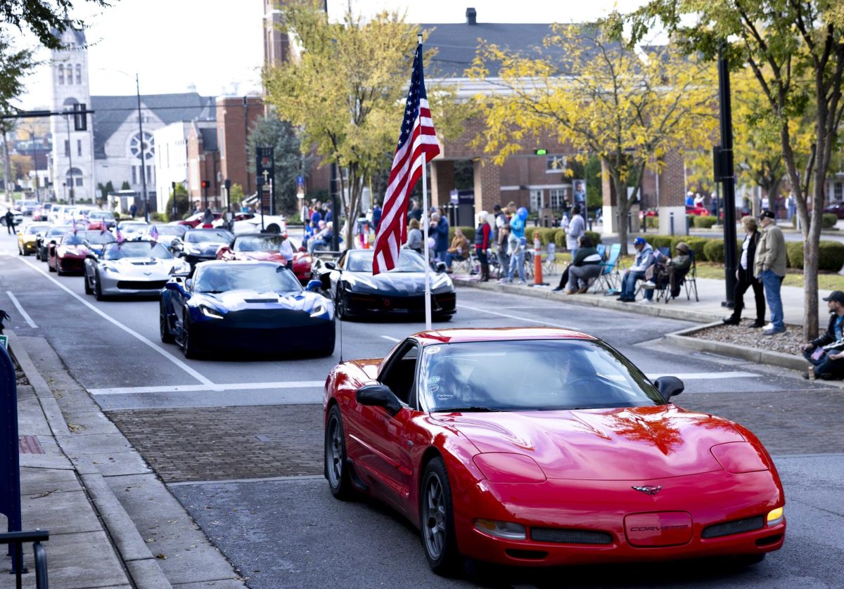 A cluster of Corvettes ride down College Street on Saturday, Nov. 8, 2025 during Bowling Green’s Veteran’s Day parade. 