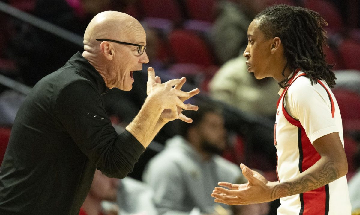 Western Kentucky University head coach Greg Collins yells at Western Kentucky University guard Tia Shelling (3) on Tuesday, Nov. 11, 2025, during the basketball game against Wichita State in E.A. Diddle Arena in Bowling Green, Ky.