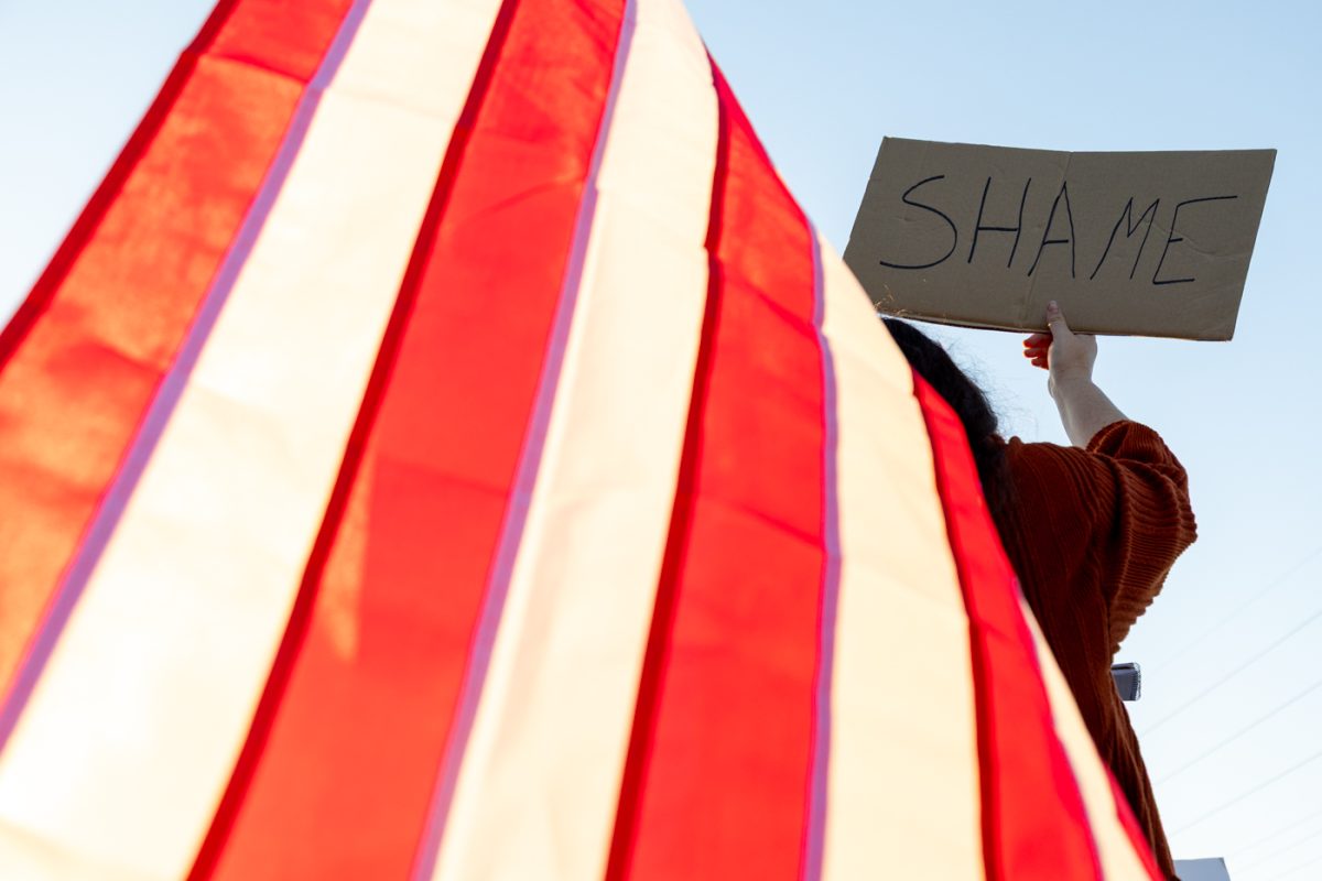 Brittany Sperriko stands outside of Bowling Green’s DHS headquarters on Wednesday, Nov. 5, 2025, during an impromptu protest of the recent arrest of Ismael Cruz Sanchez by ICE.