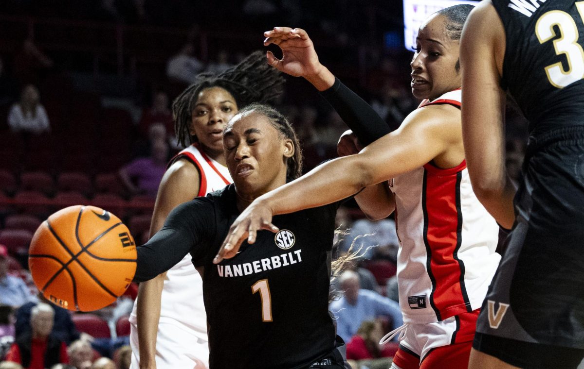 Western Kentucky University forward Tatum Boettjer (13) passes the ball during WKU’s game against Vanderbilt University on Nov. 19, 2025.