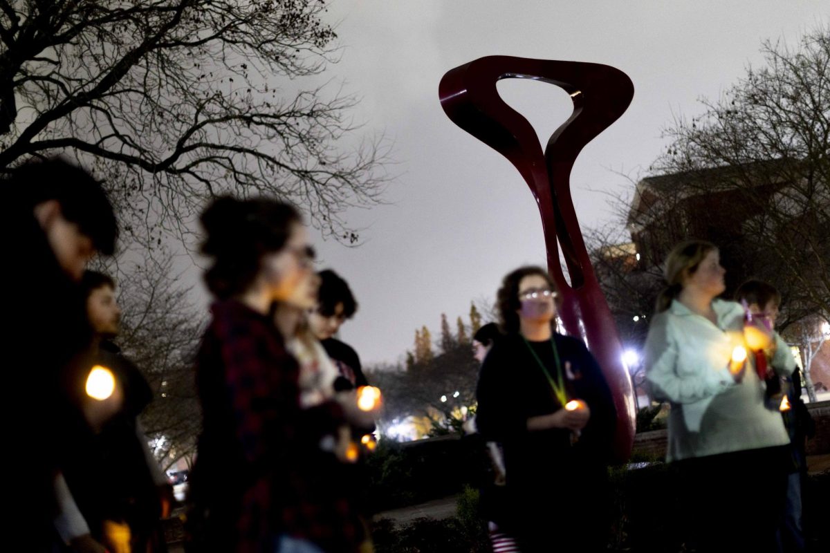 Friends and family gather in Centennial Mall for a vigil hosted by the Queer Student Union in remembrance of Gender Identity Alliance Leader Ruby Miller on Wednesday, Nov. 19, 2025. The Queer Student Union chose to rename the Gender Identity Alliance subgroup “Friends of Ruby” beginning spring of next year. 