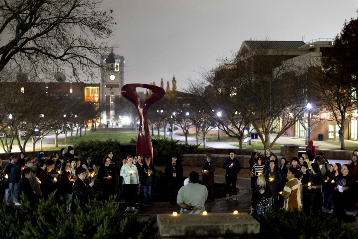 Friends and family gather in Centennial Mall for a vigil hosted by the Queer Student Union in remembrance of Gender Identity Alliance Leader Ruby Miller on Wednesday, Nov. 19, 2025.