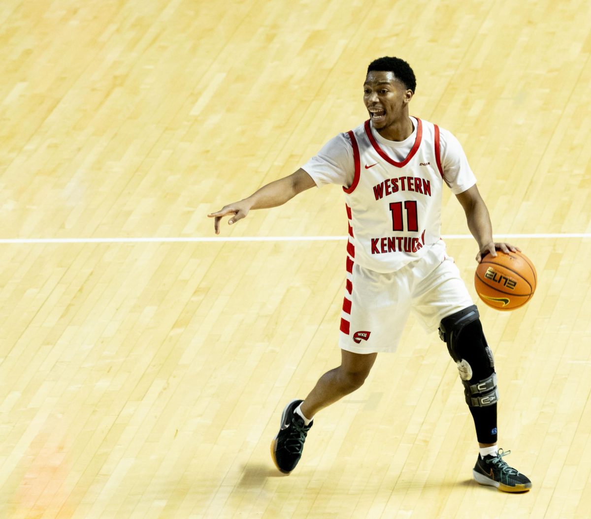 WKU guard Terrion Murdix (11) stands alone near half court while the Tennessee State defense runs off-coverage during WKU’s basketball game against Tennessee State on Sunday, Nov. 16, 2025 in E.A. Diddle Arena.
