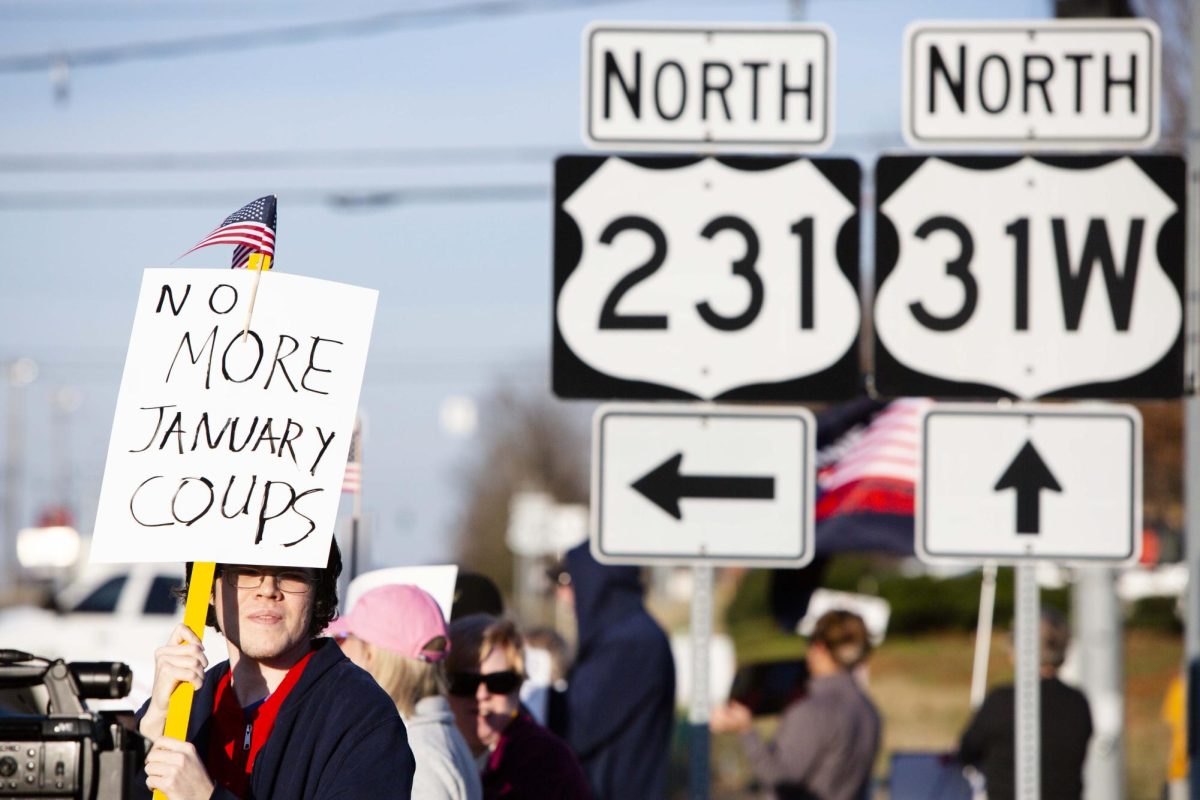 Protestors gather during SOKY Indivisible’s demonstration against Venezuelan President Nicolàs Maduro’s arrest under President Donald Trump on the corner of Nashville Road and Campbell Lane on Monday, Jan. 5, 2026. 