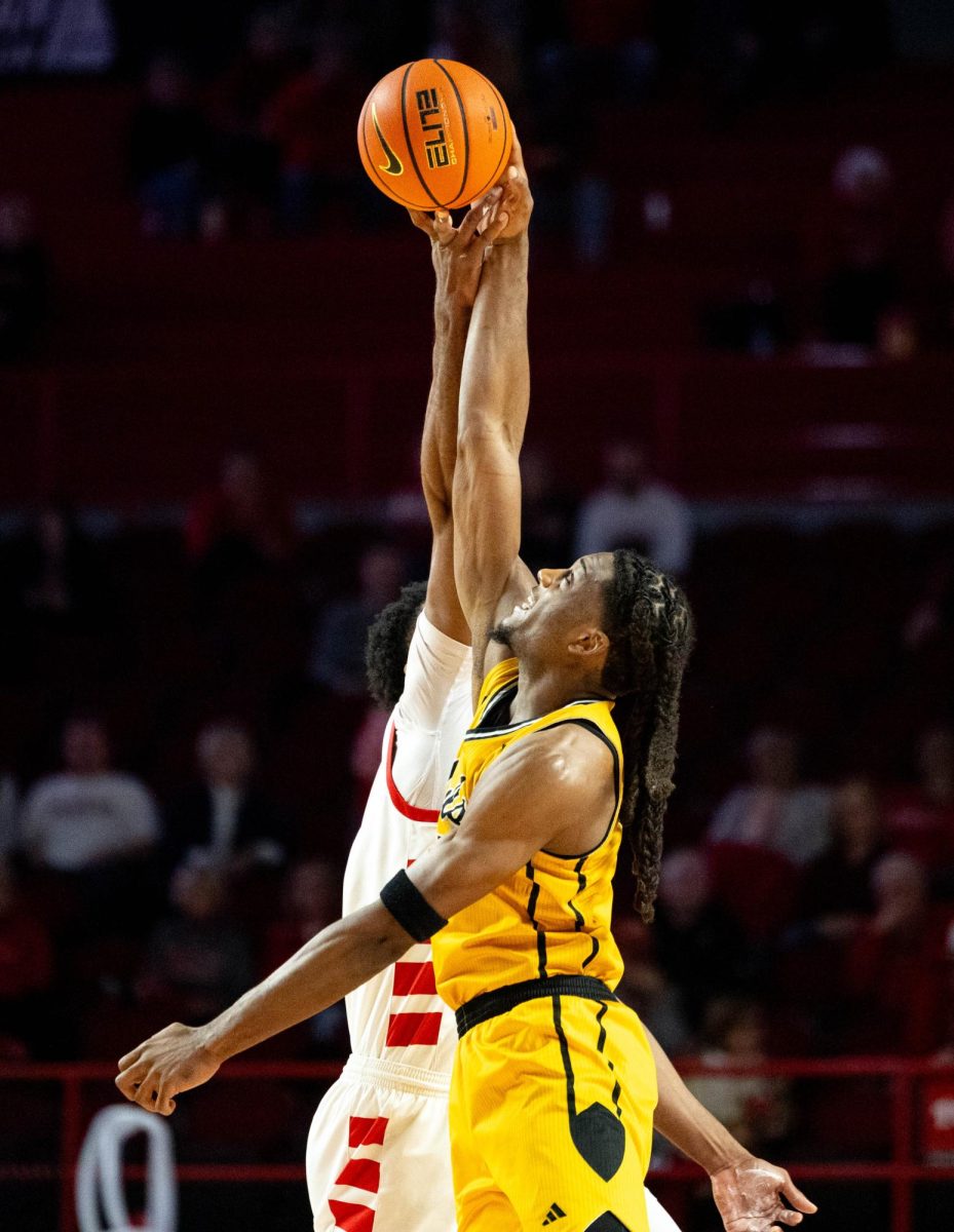 Western Kentucky Hilltoppers Forward Noah Boyde (7) goes up for tip off against Kennesaw State’s Forward Braedan Lue (13) during WKU’s game against the Kennesaw State Owls in E.A. Diddle Arena on Saturday, Jan. 17, 2026. 