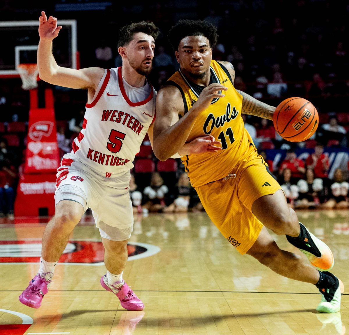 Western Kentucky Hilltoppers Guard Jack Edelen (5) attempts to guard Kennesaw State’s Guard RJ Johnson (11) as he strides down the court during WKU’s game against the Kennesaw State Owls in E.A. Diddle Arena on Saturday, Jan. 17, 2026. 