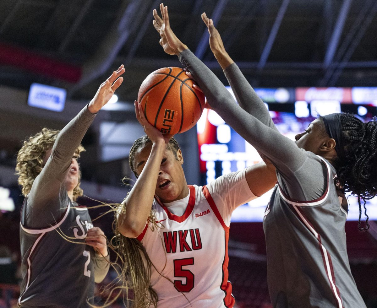 Western Kentucky University Hilltoppers forward Mya Pratcher (5) drives into defense during WKU’s game against the New Mexico State Aggies on Thursday, Jan. 8, 2026, in E.A. Diddle Arena in Bowling Green, Ky.