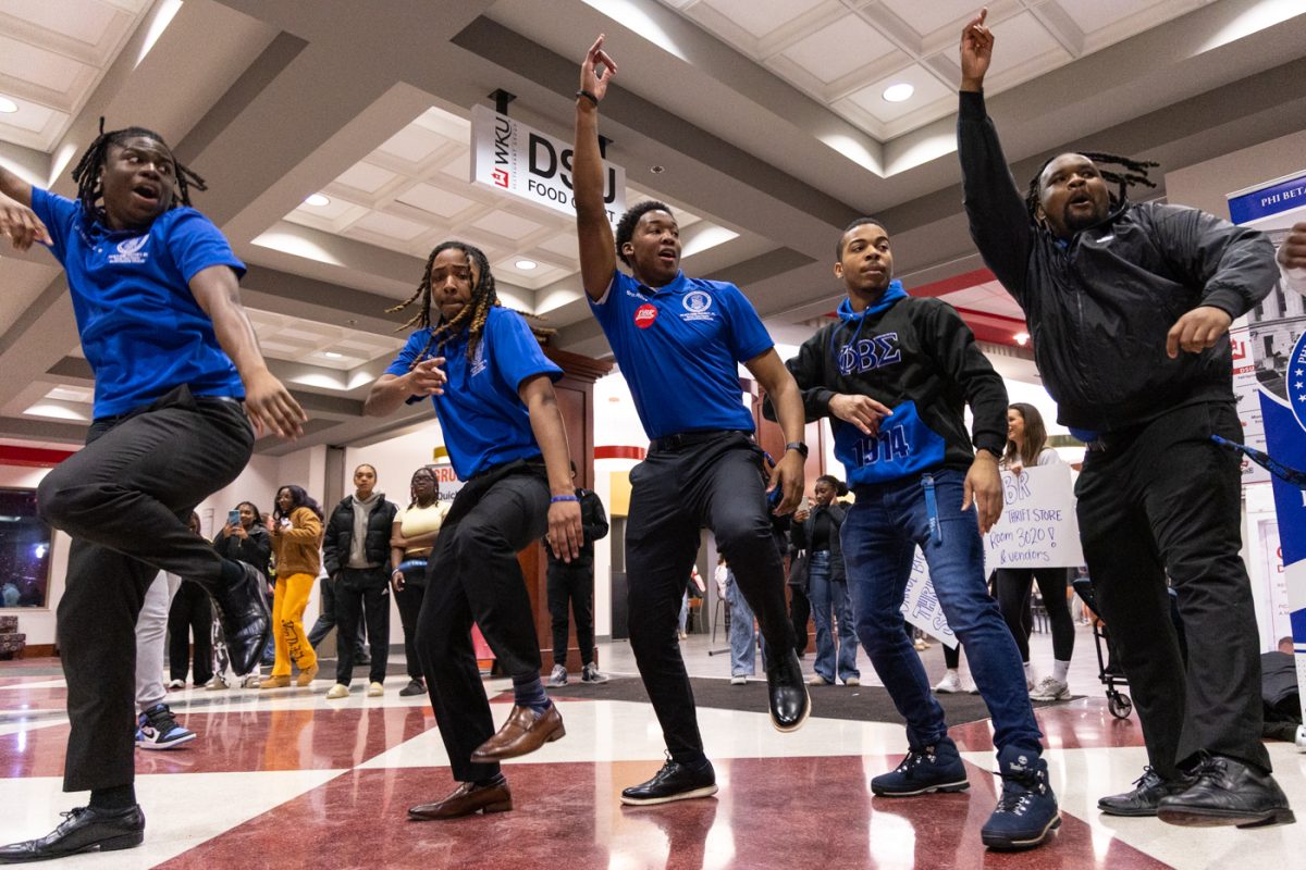 Members of Western Kentucky University’s Phi Beta Sigma fraternity dance around the first floor of Downing Student Union during the Black Student Alliance’s Black Excellence after Dark event on Tuesday, Feb. 3, 2026.