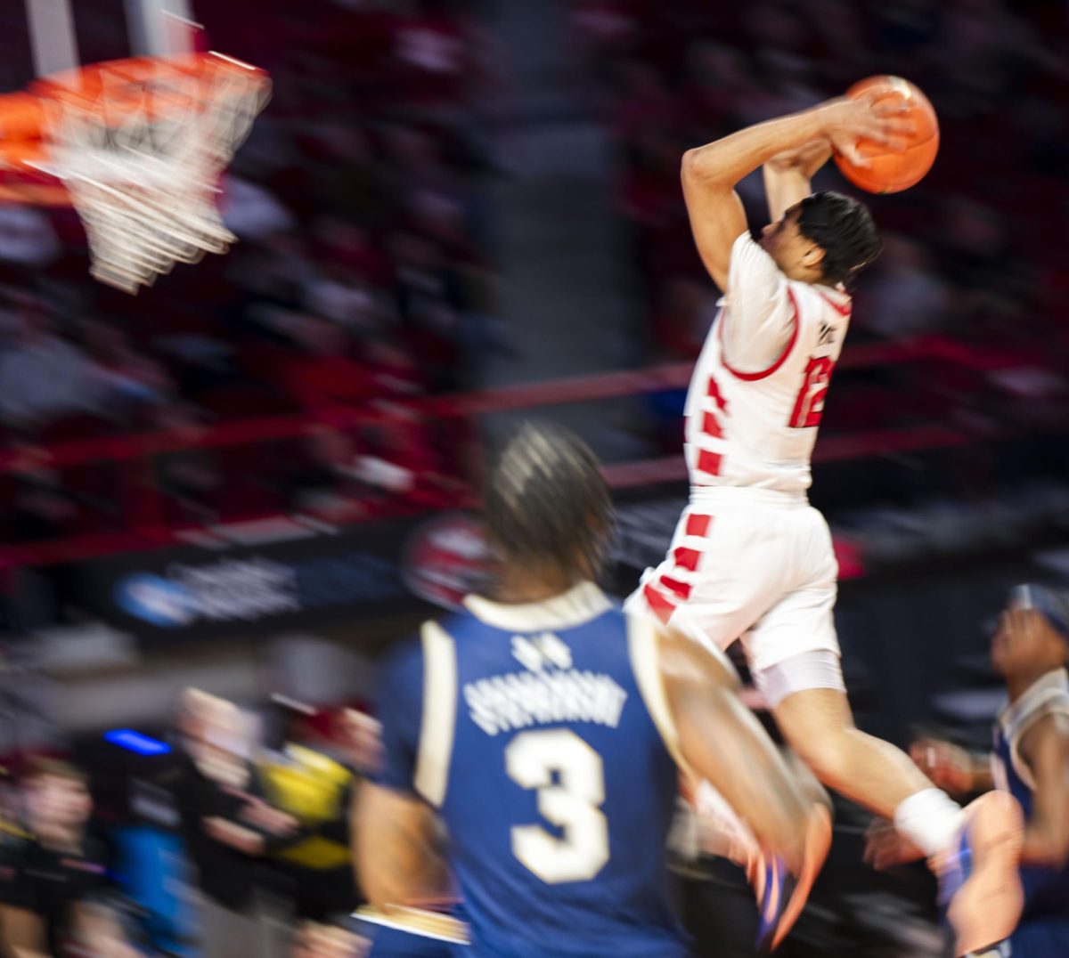 Western guard Armelo Boone (12) leaps for a dunk in a game against FIU on Saturday, Feb. 7, 2026 in E.A. Diddle Arena. Boone ended the game with five points. 
