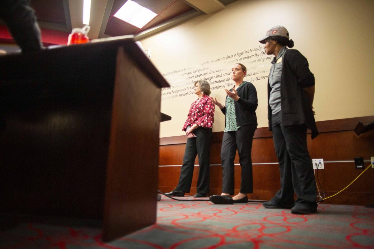 WKU Restaurant Group members (from left) Nena Shomler, Kelci Murphy, and Tiffany Blackman answer questions submitted by senators during the Student Government Association’s weekly meeting in the Downing Student Union Senate Chamber’s on Tuesday, Feb. 10, 2026. Senators questioned the Restaurant Group on the removal of Steak’n’Shake’s seasoning, implementing kiosk in Subway, and adding spicy chicken sandwiches to Chick-Fil-A’s meal swipe menu. 