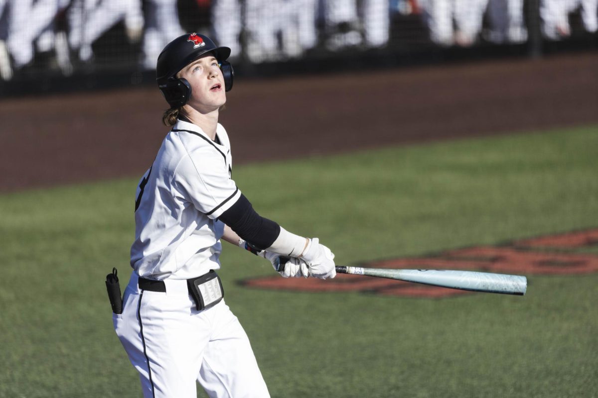 Western infielder Reid Howard (3) watches a ball fly after a hit during Western’s game against Brigham Young University on Friday, Feb. 13, 2026 at Nick Denes Field. Howard was the second to last hitter in the game and finished the match with one hit and two stolen bases overall.