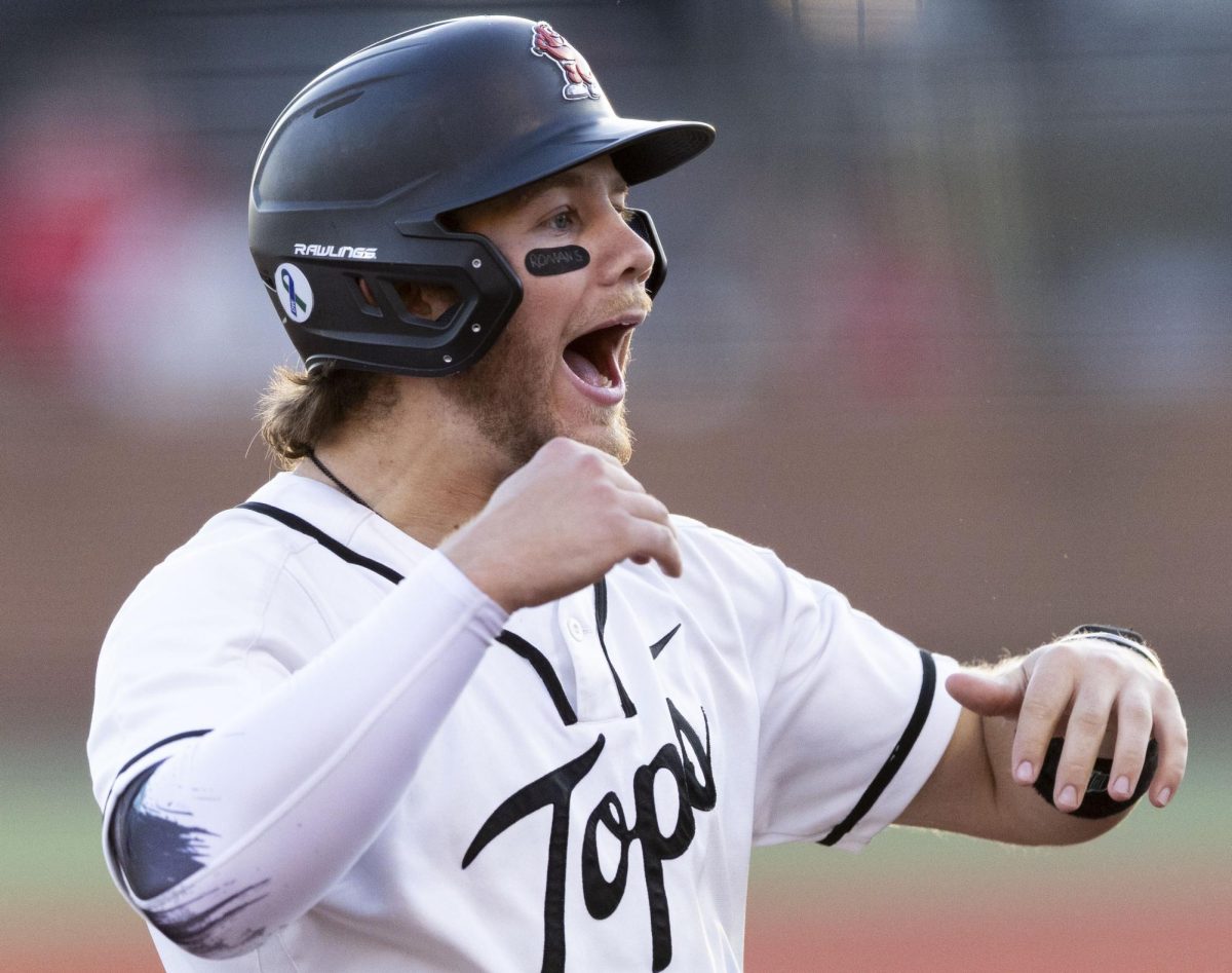 Western Kentucky University catcher Camden Ross (8) screams in happiness after western outfielder Kiefer Tarnoki (10) receives a hit by pitch after a debate during Western’s game against Indiana University on Friday, Feb. 27, 2026 at Nick Denes Field. Ross finished the game with three hits, two runs batted in, one run, and a whopping 10 put outs.