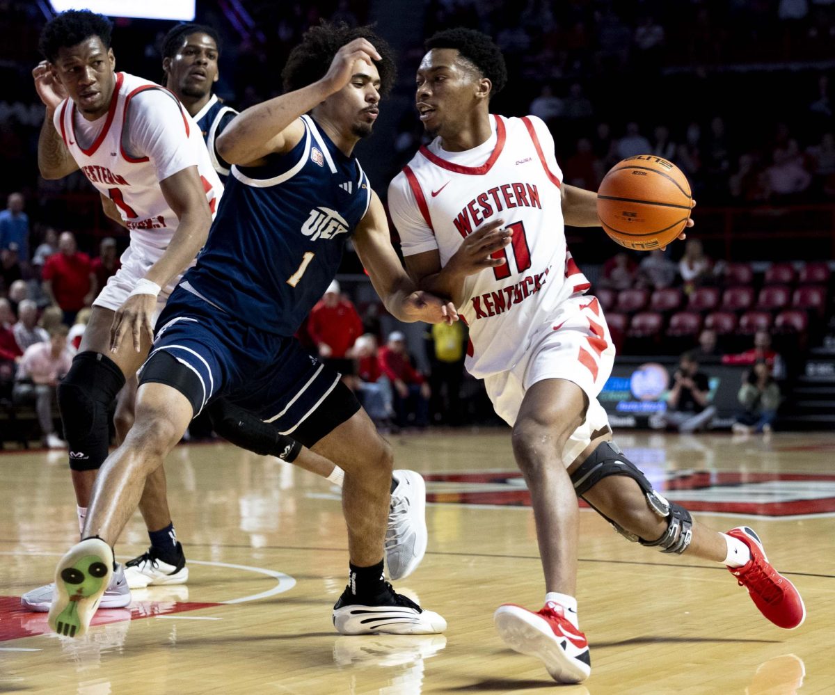 Western Kentucky University Hilltoppers guard Terrion Murdix (11) runs down the court evading University of Texas at El Paso’s guard KJ Thomas (1) during WKU versus UTEP on Saturday, Feb. 28, 2026. 