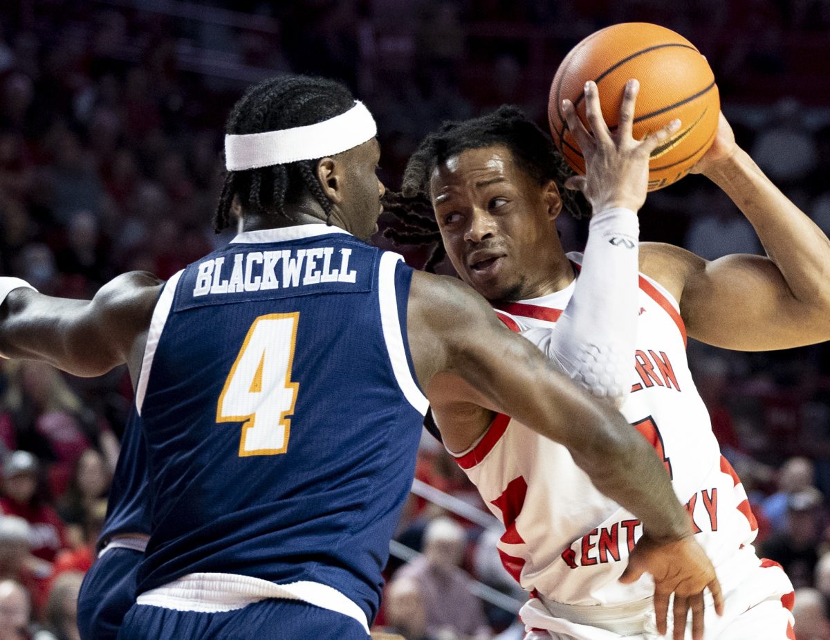 Western Kentucky University Hilltoppers guard Ryan Myers (4) guards ball from University of Texas at El Paso’s guard Caleb Blackwell (4) during WKU versus UTEP on Saturday, Feb. 28, 2026.