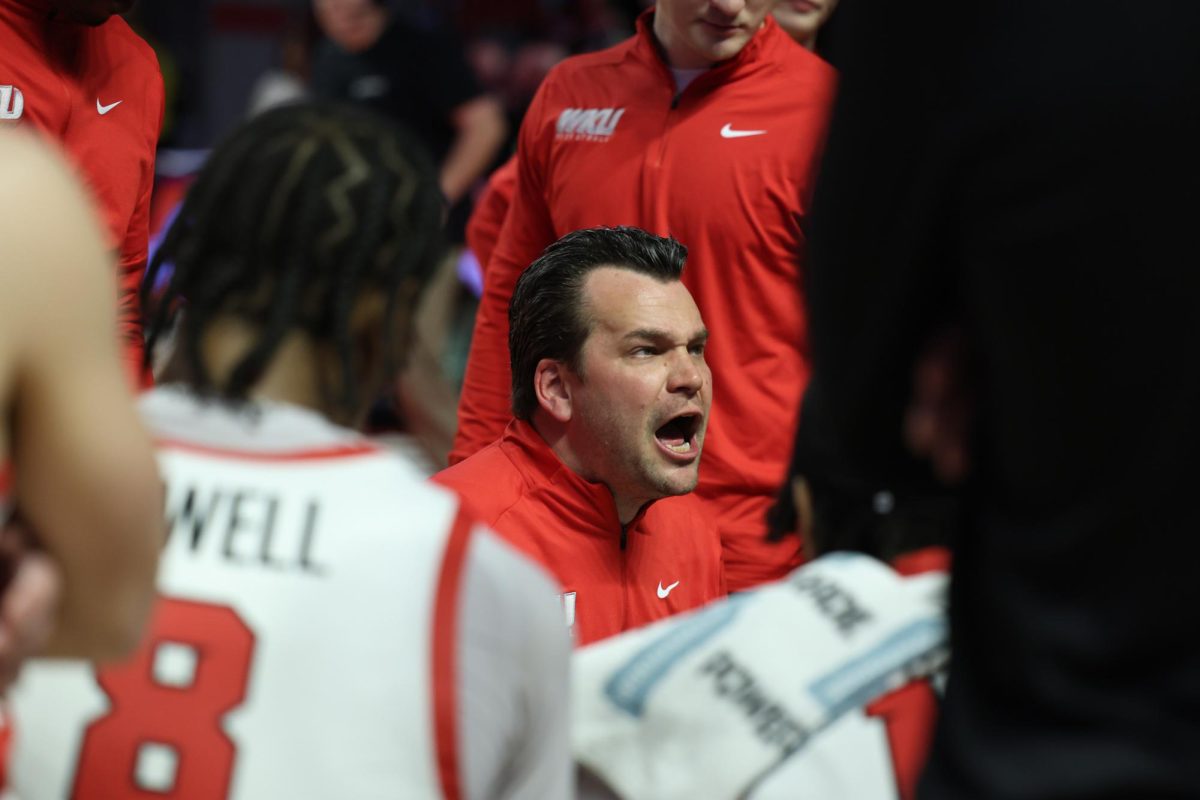 Western Kentucky University head basketball coach Hank Plona gives a speech during a timeout on Saturday, February 28.