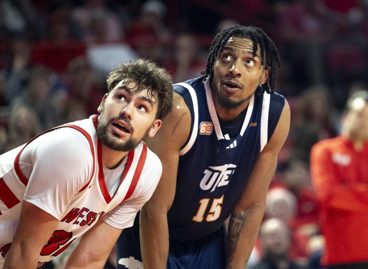 Western Kentucky University Hilltoppers guard Teagan Moore (30) and University of Texas at El Paso forward Jamal West Jr. (15) watch as UTEP attempts a free throw during the WKU vs. UTEP basketball game on Saturday, Feb. 28, 2026 held in E.A Diddle Arena. 