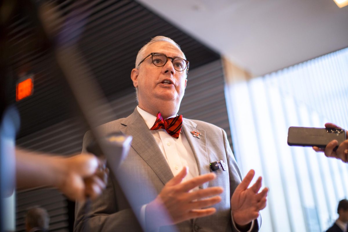WKU President Timothy Caboni speaks with the press after the Amy and David Chandler Hall Dedication and Ribbon Cutting ceremony on Friday, Sept. 19, 2025.