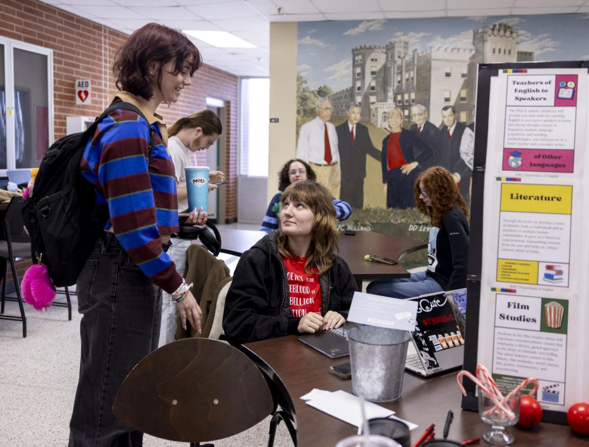 Western Kentucky University English for Secondary Teachers Major Elly Clift speaks to Literature Major Abigail Goehner during the English Unbound Day held by WKU’s Department of English in Grise Hall on Wednesday, Feb. 11, 2026.