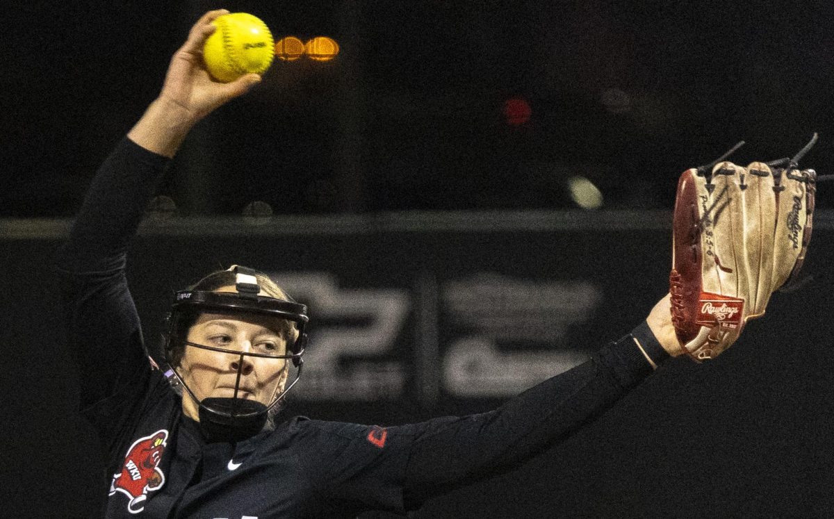 Western Kentucky University Hilltoppers right-handed pitcher and utility Erica Houge (11) throws a pitch during the first inning of a home game on Friday, Feb. 20, 2026 against the Western Michigan Broncos.
